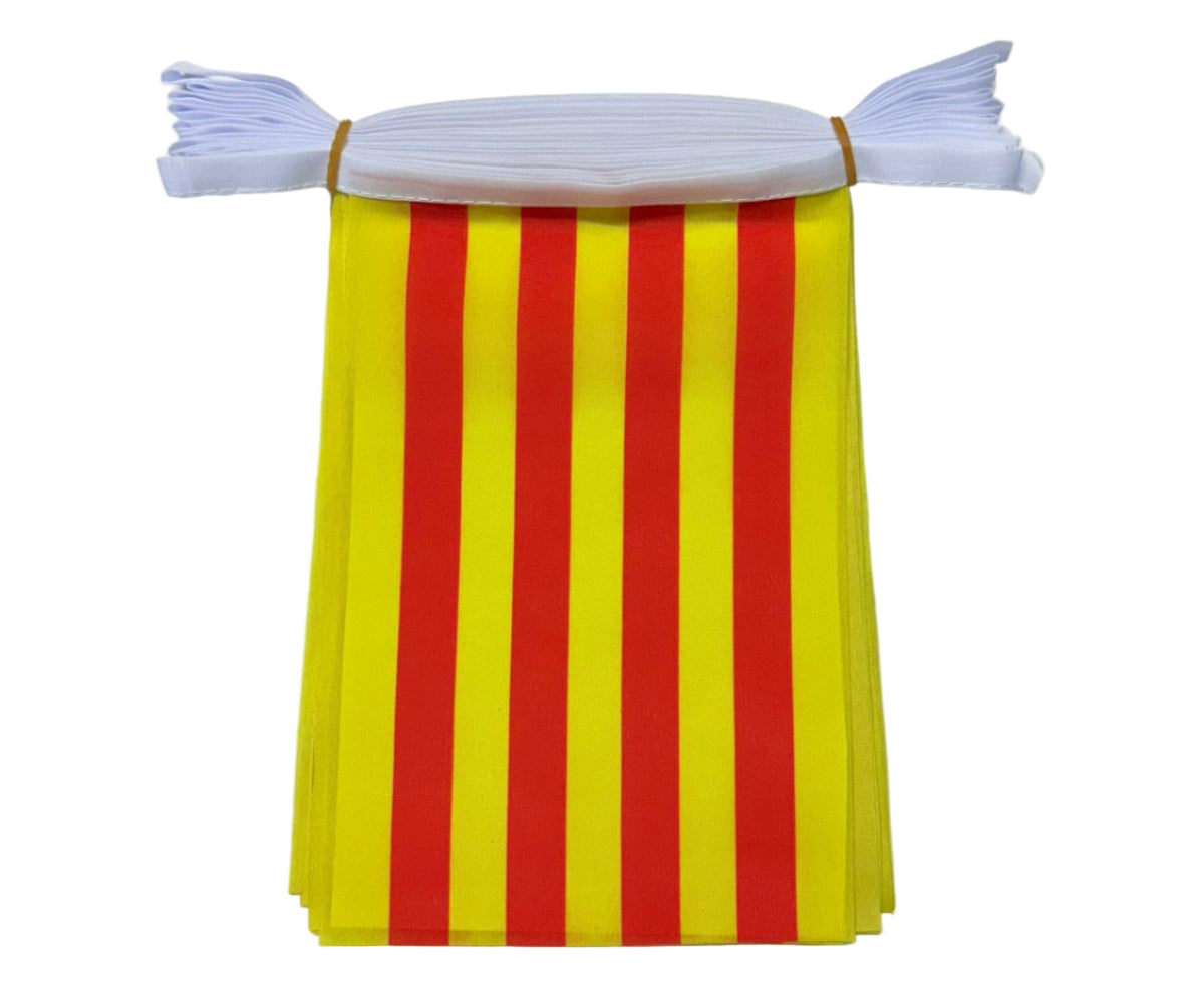 Yellow and red striped fabric with white bunting