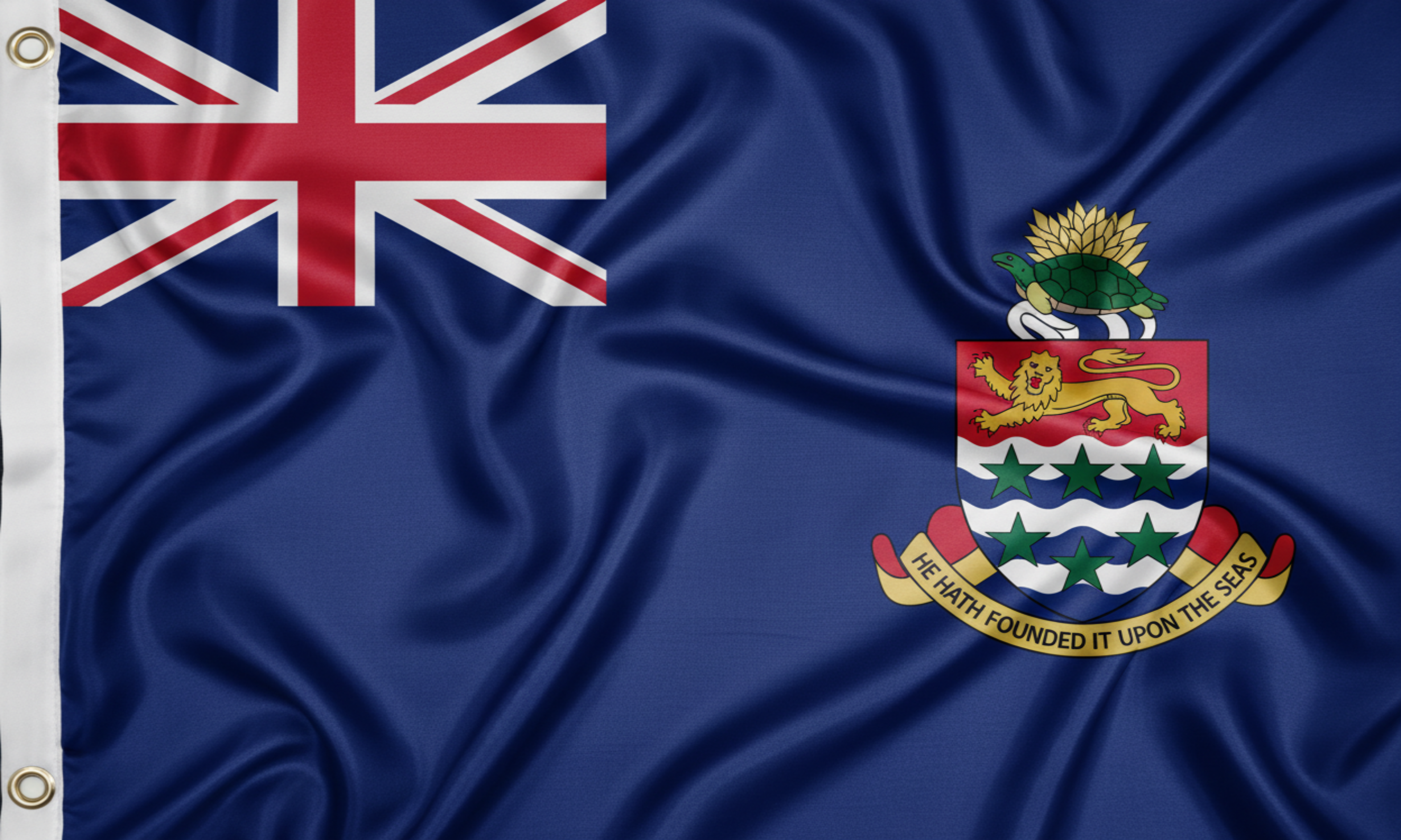 Flag with Union Jack and coat of arms on a blue background