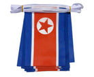 North Korean flag bunting with a red star on a white string